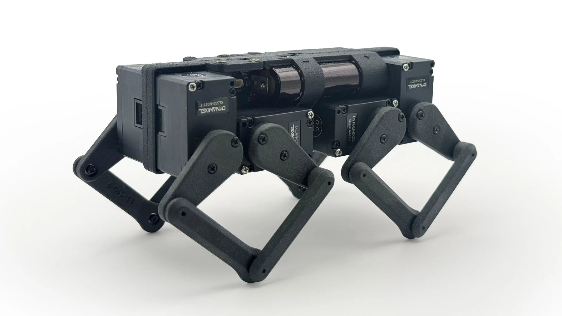 Q8botOne quadruped with a rectangular body and four parallel-linkage legs